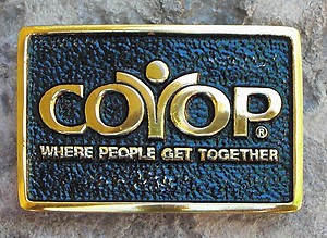 Consumers Cooperative of Berkeley belt buckle