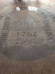 Center tile of the floor of the Market House