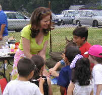 Michelle Ferguson-Cohen and a group of children.jpg