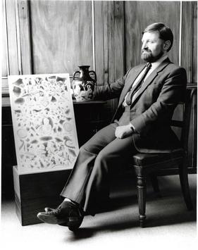 Black and white photograph of Nigel Williams with the Portland Vase and an 1845 watercolour by Thomas H. Shepherd showing the shattered fragments