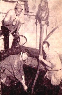 Working inside the bell on the sea floor