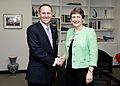 John Key Helen Clark handshake