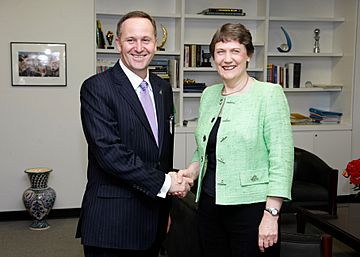 John Key Helen Clark handshake