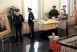 Rhea Chiles embracing her son Bud Chiles during the funeral of Lawton Chiles