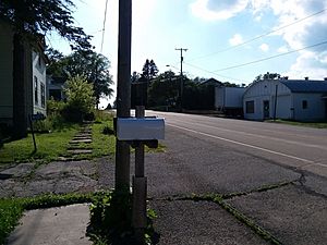 County Road O is the primary and sole modern-day   thoroughfare for the small hamlet.