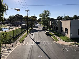 2021-09-20 08 57 54 View east along New Jersey State Route 28 (Plainfield Avenue) from the overpass for the rail line near Second Street in Plainfield, Union County, New Jersey