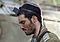 IDF soldier kippah put on tefillin-small.jpg