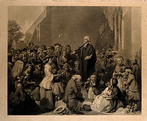 John Wesley preaching outside a church. Engraving. Wellcome V0006868