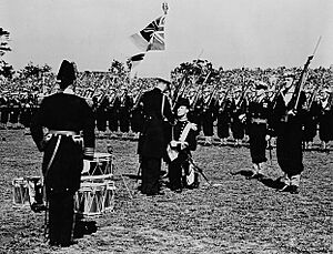 King George VI presenting the King's Colour to the Royal Canadian Navy during a ceremony in Beacon Hill Park