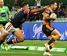 Latrell Mitchell grabbing Darius Boyd