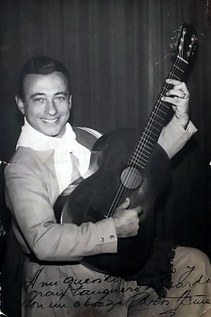 Carlos-Acuña-playing-guitar.jpg