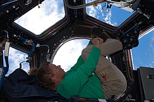 STS-135 Sandy Magnus in the Cupola