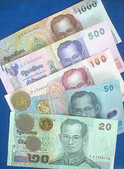 Baht banknotes and coins issued by the Bank of Thailand