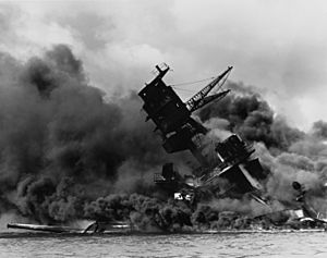 The USS Arizona (BB-39) burning after the Japanese attack on Pearl Harbor - NARA 195617 - Edit