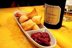 Gnocco fritto, salame, and lambrusco