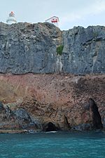 Lighthouse above cliffs at Taiaroa Head