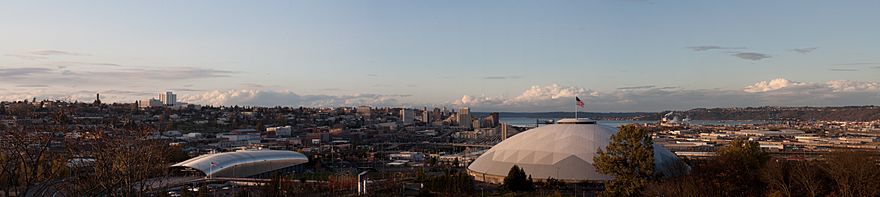 Panorama of Tacoma from the McKinley neighborhood with the Tacoma Dome in the foreground and the Puget Sound in the background.