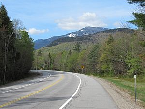 New Hampshire Route 16 in Martin's Location, May 2019. Mount Washington rises to the south, outside the township.