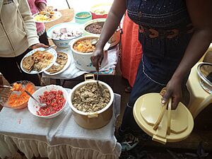 Njahi, Nduma, Chapati, Kachumbari, chicken - an average Kikuyu party mix