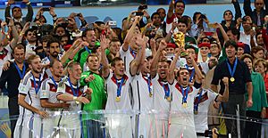 Philipp Lahm lifts the 2014 FIFA World Cup