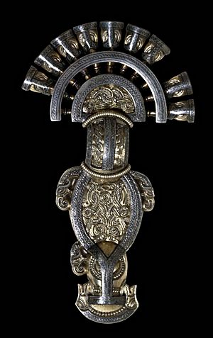 Silver-gilt radiate-headed brooch