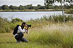 A photographer taking pictures