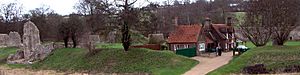 Berkhamsted Castle - Ruins of the external walls, keeper's house, castle motte in background