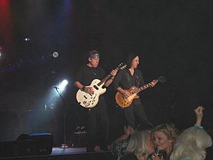 Jim Suhler performing with George Thorogood