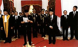 Suharto resigns