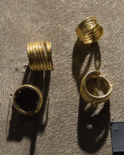 Spiral golden lock rings, Únětice culture, Bronze Age, City of Prague Museum (cropped)