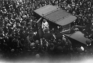 An admiring East End crowd gathers to witness the arrival of Mahatma Gandhi