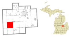 Location within Saginaw County (red) and an administered portion of the village of St. Charles (pink)