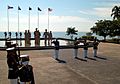 US Navy 041020-N-0493B-003 Backed by a monument marking the location of Gen. Douglas MacArthur's return to the Philippines 60 years ago, a Philippine Marine Corps honor guard stands at attention during the playing of Taps