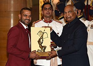 Shri Ram Nath Kovind presenting the Arjuna Award, 2021 to Shri Shikhar Dhawan