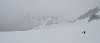 Hikers crossing Penny Royal Glacier