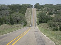 Rolling highway west of Burnet County, TX IMG 2010