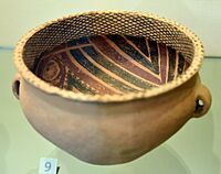 Bowl with ring handles. Earthenware painted with red and black mineral pigment. Yangshao Culture, Gansu Province. Neolithic period, 2600-2300 BCE. From the Garner Collection. Victoria and Albert Museum