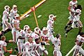 Badgers carrying Paul Bunyan's Axe