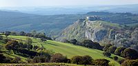 Carreg Cennen Castle on its crag and in its Carmarthenshire landscape, autumn light