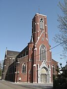 Religious building in Neo-Gothic style in brick.