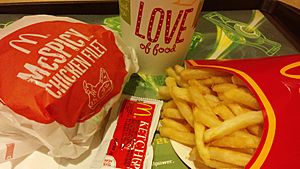 HK Kln Bay Telford Plaza McDonalds Restaurant McSPICY Chicken Filet French fries Nov-2014 Love mark sign n coke