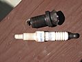 Spark plug insulator