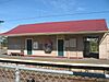 Beaconsfield station and the main building viewed from outside of the station