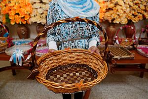 A young Syrian refugee girl in Lebanon shows a basket that she’s just learnt how to make and decorate at a UNICEF vocational training session supported by UK aid. (14496181410)