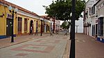 A street with single-storied colorful houses