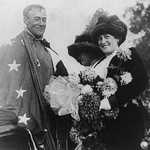 Cal Rodgers draped with U.S. flag upon arrival in Pasadena (cropped)