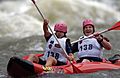 US Navy 041009-N-1810F-044 Journalist 1st Class Lizandra Murray and Chief Petty Officer Mark Rinschler, both assigned to Naval Media Center, Washington, D.C., maneuver their Duckie whitewater boat down rapids