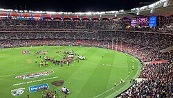 2021 AFL Grand Final, Perth Stadium, Simon Goodwin and Max Gawn hoist up the cup together, 25 September 2021