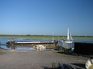 Barge and passing yacht - geograph.org.uk - 1453452