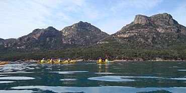 Sea kayaking from Coles Bay.jpg